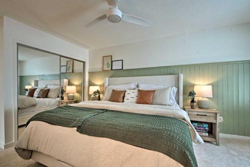 a bedroom with a large bed with a large mirror at BigBoulder Lakeview Terrace-Minutes from the Lake in Lake Harmony