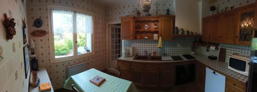 Dapur atau dapur kecil di Maison dans un grand parc
