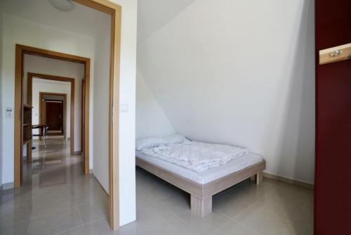 Ένα ή περισσότερα κρεβάτια σε δωμάτιο στο MP 7 Backbord