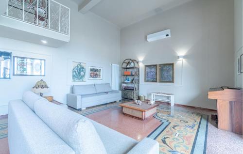 a living room with a couch and a table at 1 Bedroom Nice Apartment In Recco in Recco