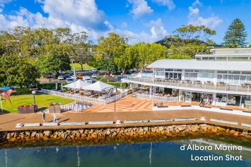 an aerial view of a hotel and the water at 14A Grafton St - Studio with air con and wi-fi in Nelson Bay