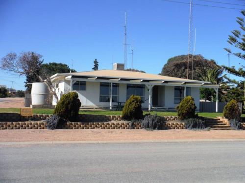 a house on the side of the road at Aquamarine in Port Moonta