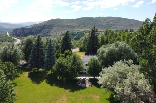 an aerial view of a park with trees and a road at 4 Bedroom Luxury home in Kamas in Kamas