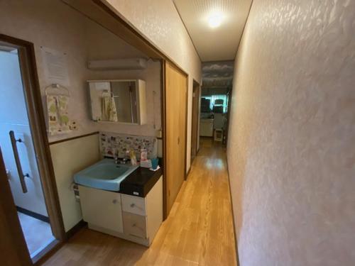 Postel nebo postele na pokoji v ubytování Guesthouse Oomiya base 大宮基地別荘