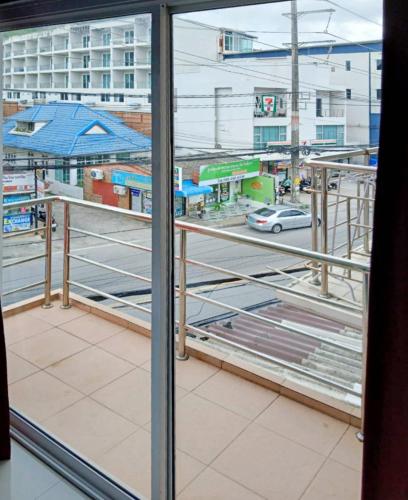 a view from a window of a parking lot at Sunray Beach Hotel Patong in Patong Beach
