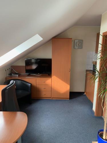 TV a/nebo společenská místnost v ubytování Hotel Nord
