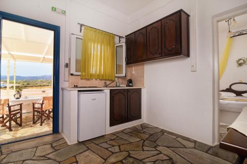 Cuisine ou kitchenette dans l'établissement Anemes