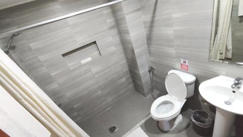 Koupelna v ubytování Rajah Park Hotel by Hiverooms