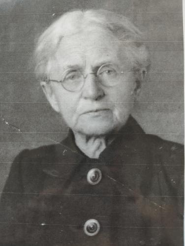 an old picture of an older man wearing glasses at Vila Adelaide in Brtníky