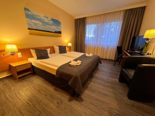 Hotel am Tierparkにあるベッド
