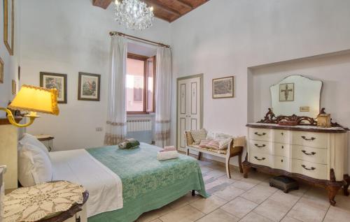 Postel nebo postele na pokoji v ubytování Palazzo Falzacappa