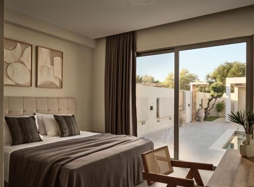Кровать или кровати в номере Anastasia Villa - Kalpaki Village, by ZanteWize