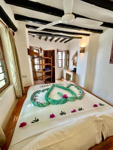Letto o letti in una camera di HEBE Bungalows Lodge