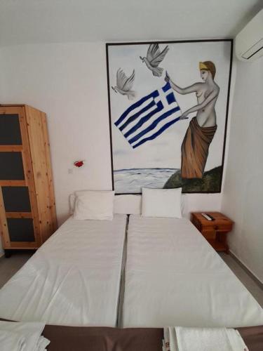 Cama o camas de una habitación en Iliada