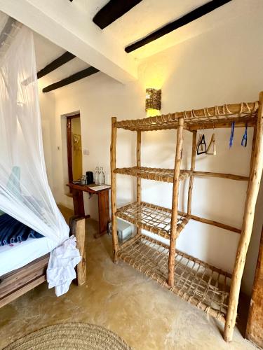 Letto o letti in una camera di HEBE Bungalows Lodge