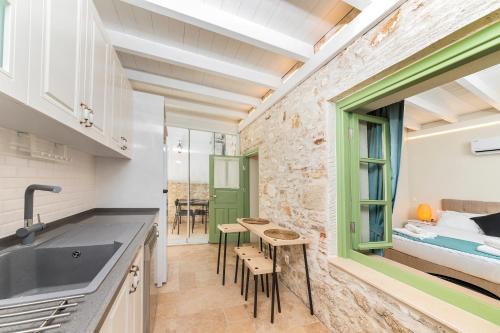 Kuchyň nebo kuchyňský kout v ubytování Mets Boutique Hotel