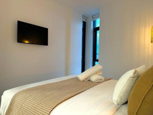 Katil atau katil-katil dalam bilik di Harbour Towers, Newcastle's Elite Apartment Stays, Free Parking & Tram Access