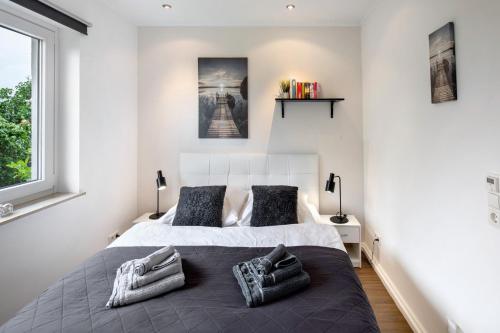 Postel nebo postele na pokoji v ubytování Ferienwohnung Glücksmomente