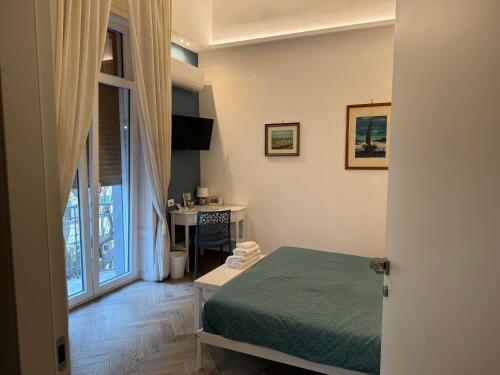Postel nebo postele na pokoji v ubytování SergHouse