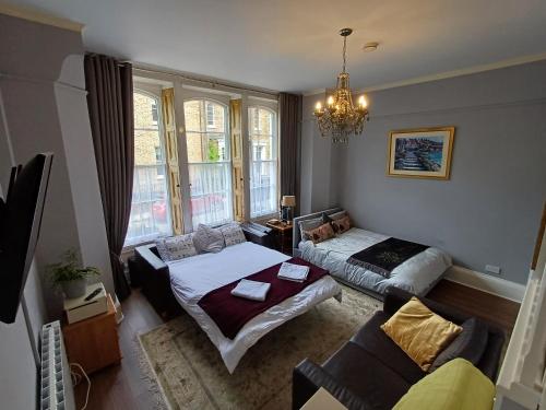 Postel nebo postele na pokoji v ubytování Abbotts Mews Apartment York City Centre