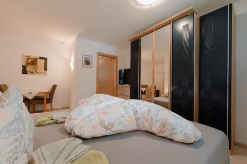 a bedroom with a bed with a pillow on it at Haus Schennach in Längenfeld