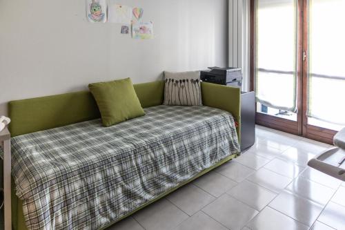 Ένα ή περισσότερα κρεβάτια σε δωμάτιο στο Don Milani