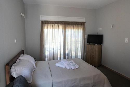 Cama o camas de una habitación en Thea Luxury residences