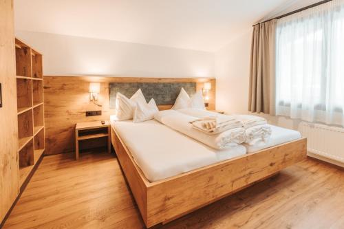Katil atau katil-katil dalam bilik di Regitnig - 4 Sterne Hotel und Chalets