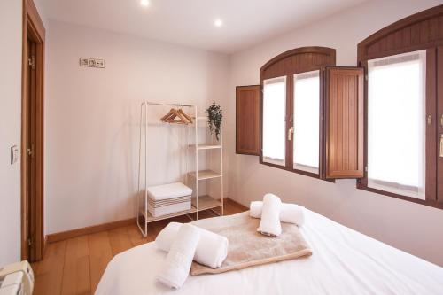 A bed or beds in a room at Busgosu, casa a 300 m de la playa de Poo VV-993-AS