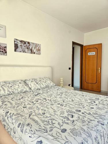 Ένα ή περισσότερα κρεβάτια σε δωμάτιο στο Vicky's House Venezia