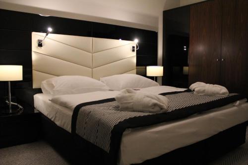 Posteľ alebo postele v izbe v ubytovaní Apartament prywatny 327 w Diune Resort