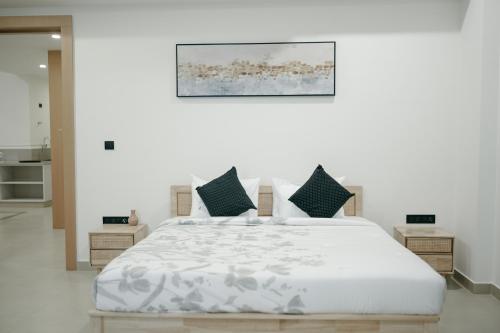 Cama o camas de una habitación en Atmosfera Bengaluru, India