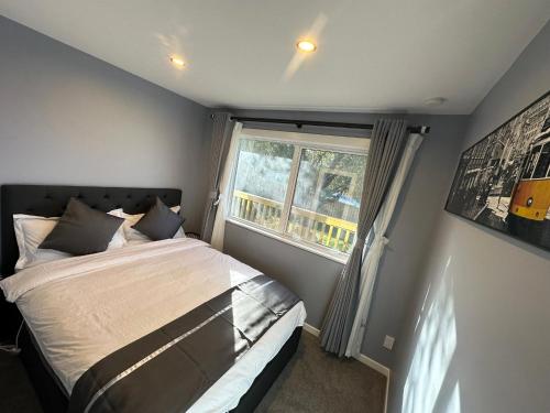 Ένα ή περισσότερα κρεβάτια σε δωμάτιο στο 3 Bedroom House North Shore