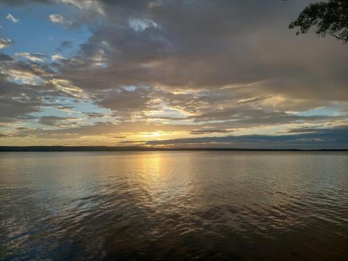a sunset over a large body of water at Rodinný wellness hotel U Langrů in Dolní Věstonice