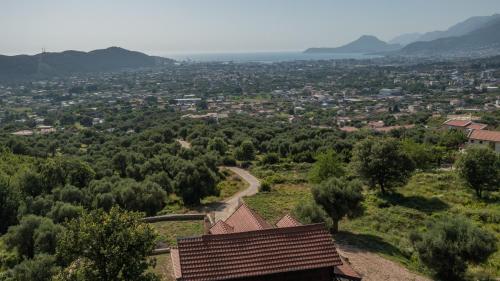 a view of a town from a hill at Panora Oliva in Rap