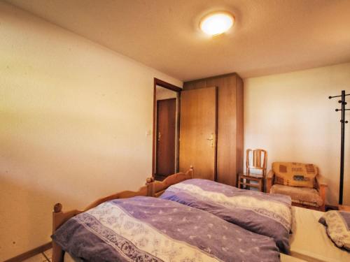 Postel nebo postele na pokoji v ubytování Apartment Les Rocailles by Interhome
