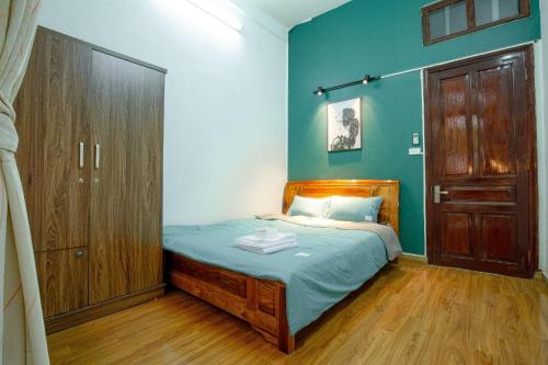 Krevet ili kreveti u jedinici u okviru objekta Sisan Homestay 294 Kim Mã Ban công thư giãn