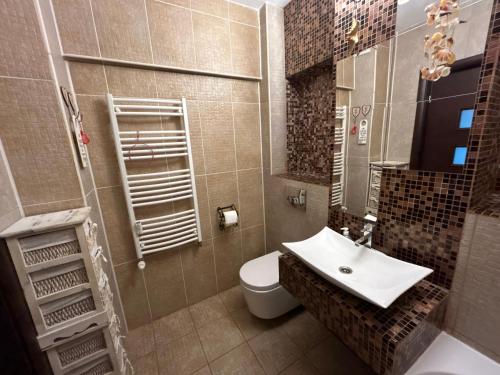 O baie la Luxury & Cosy - Infinit Apartments