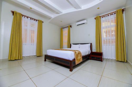 Postel nebo postele na pokoji v ubytování Vipingo Beach Resort