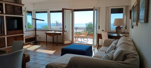 Posezení v ubytování VelaLatina Residence B&B Soverato - Camera Scirocco