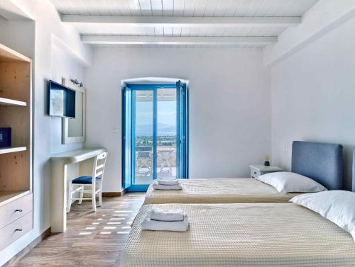 Ένα ή περισσότερα κρεβάτια σε δωμάτιο στο Luxurious Villa Seirios