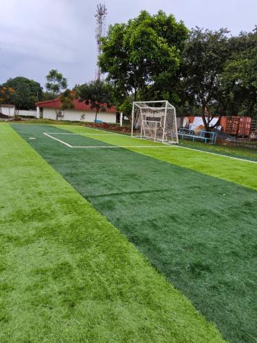 a soccer field with a soccer goal on it at Jsons executive suites in Nairobi