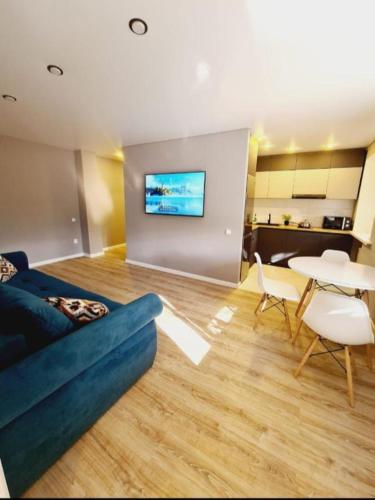 Et tv og/eller underholdning på Бухар Жирау 44