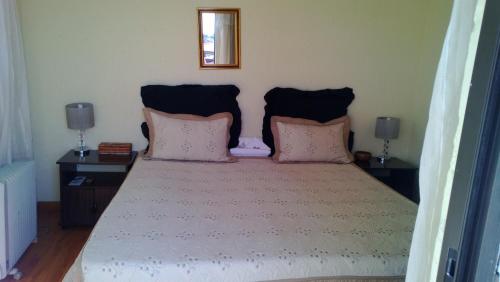 Postel nebo postele na pokoji v ubytování Flossie B&B