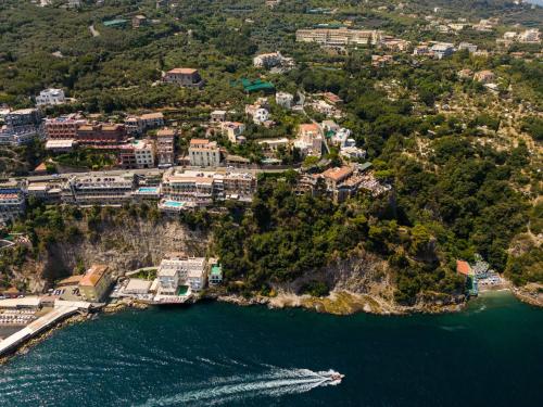 an aerial view of a boat in a body of water at Relais Francesca Pool&View in Sorrento