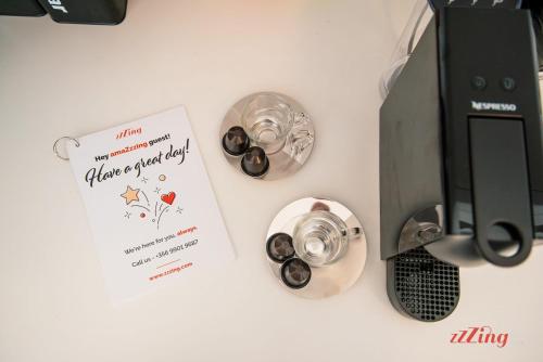 a table with a happy anniversary card next to a toaster at Stylish Retreat in a Charming Maltese Village in Għargħur