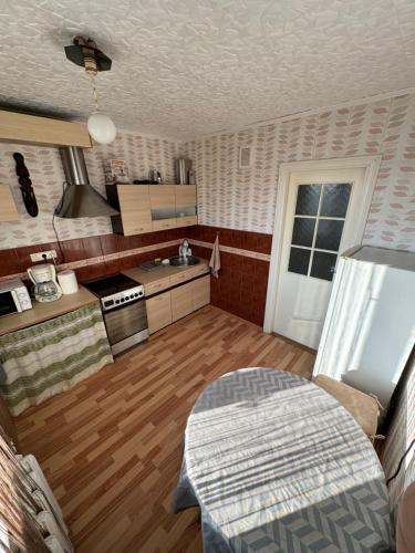Кухня или мини-кухня в Kastani apartment
