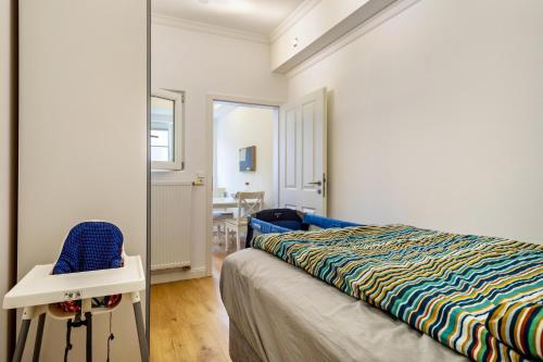 Ένα ή περισσότερα κρεβάτια σε δωμάτιο στο Eigentumswohnung mit Seeblick