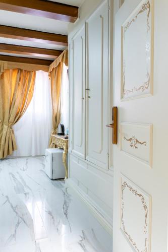 Zona de estar de Palazzo Titti Rialto Suites