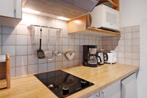 Kuchyň nebo kuchyňský kout v ubytování Appartment Bergblick